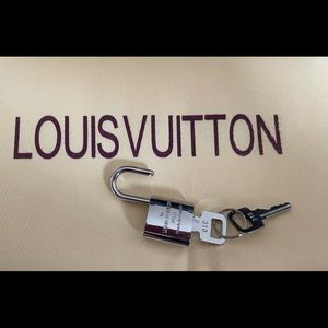 Louis Vuitton Silver Lock key set 100% authentic